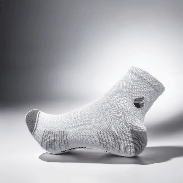 Ankle white and grey running sock with seamless toe and breathable mesh panels.