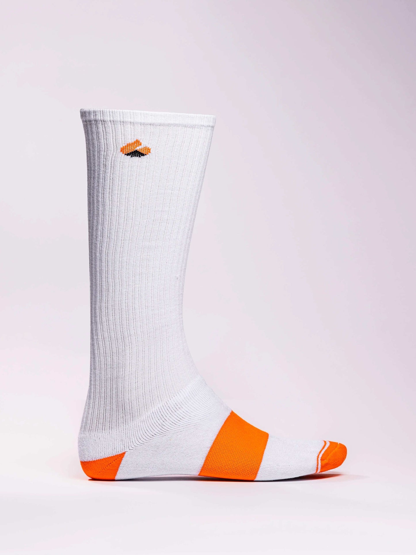 White and orange compression socks with targeted support for athletes.